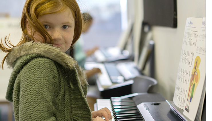 *School Age Piano and Musicianship*

Dynamic and comprehensive, our school age piano and musicianship classes for children aged 5 to 12 years are taught via our revolutionary *listen-sing-play-read* approach which accelerates progress. Our students love learning piano because classes are fun and expertly structured.

Classes involve piano playing to develop technique, singing to foster pitch, percussion to internalize rhythm, group games to nurture theoretical concepts like note reading, ensemble playing to encourage students to interact and understand music as a bigger picture, plus performance opportunities to grow confidence. 